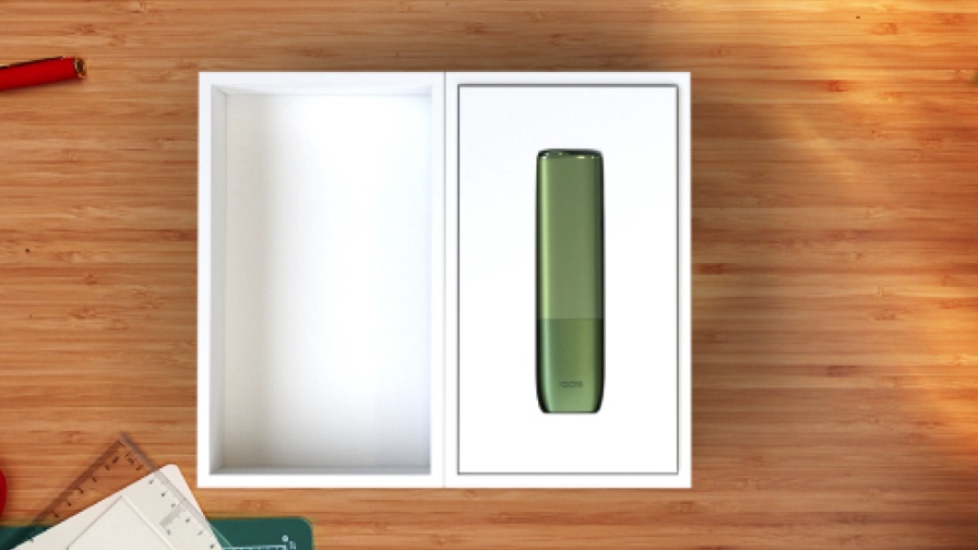 An IQOS ILUMA PRIME Holder and Pocket Charger in a box.