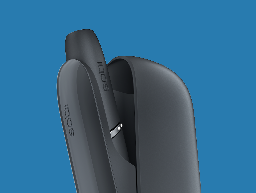 Woman checking her IQOS coach tips