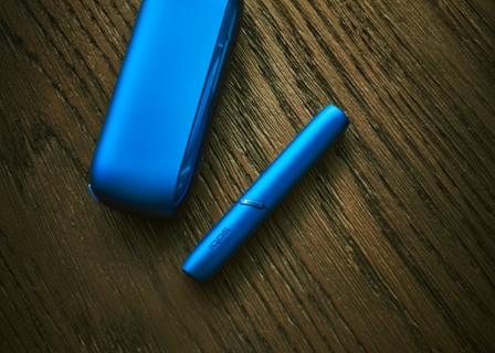 Stellar blue IQOS 3 DUO holder with HEETS stick and charger