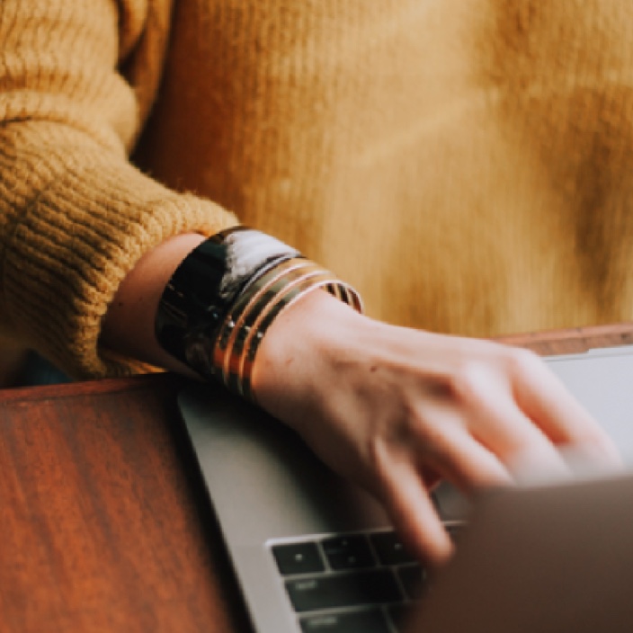 Woman using her laptop.